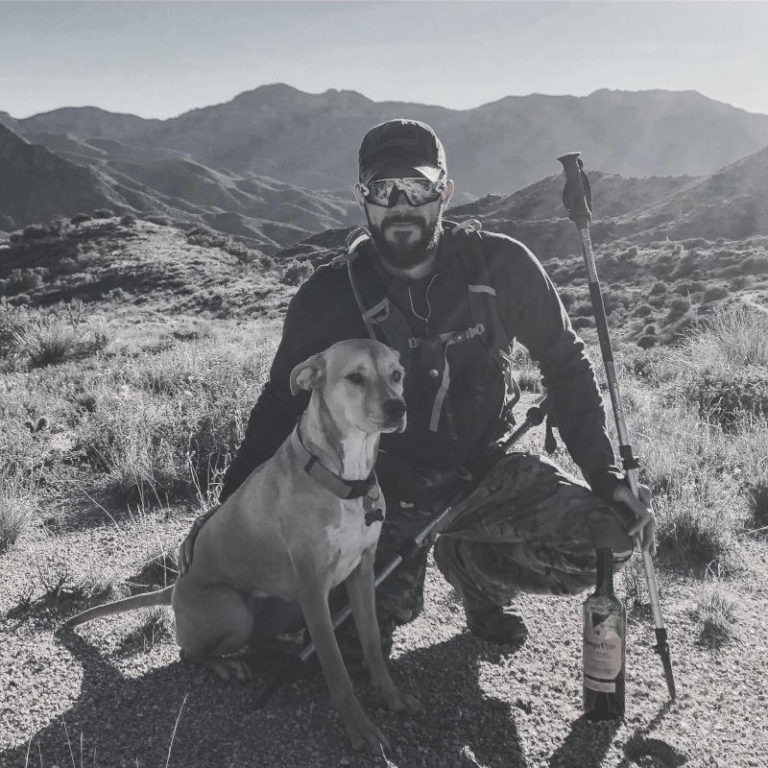 Greg Homer hiking with his dog